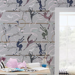 Balancing Act (Light Gray) wallpaper features colorful dancing monkeys and rabbits on a light gray background