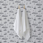Ahoy! (Fog) wallpaper with charcoal gray ships and whale tales on a light gray background