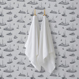 Ahoy! (Fog) wallpaper with charcoal gray ships and whale tales on a light gray background