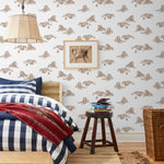 Mighty (Sand) wallpaper features brown lions and meerkats on a white background