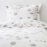 Orbit (Gray) Twin Duvet Set features gray moons, clouds and stars on a soft white background