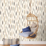 Plumes Natural Wallpaper features delicate feathers in orange, rust, blues and browns on a cream background