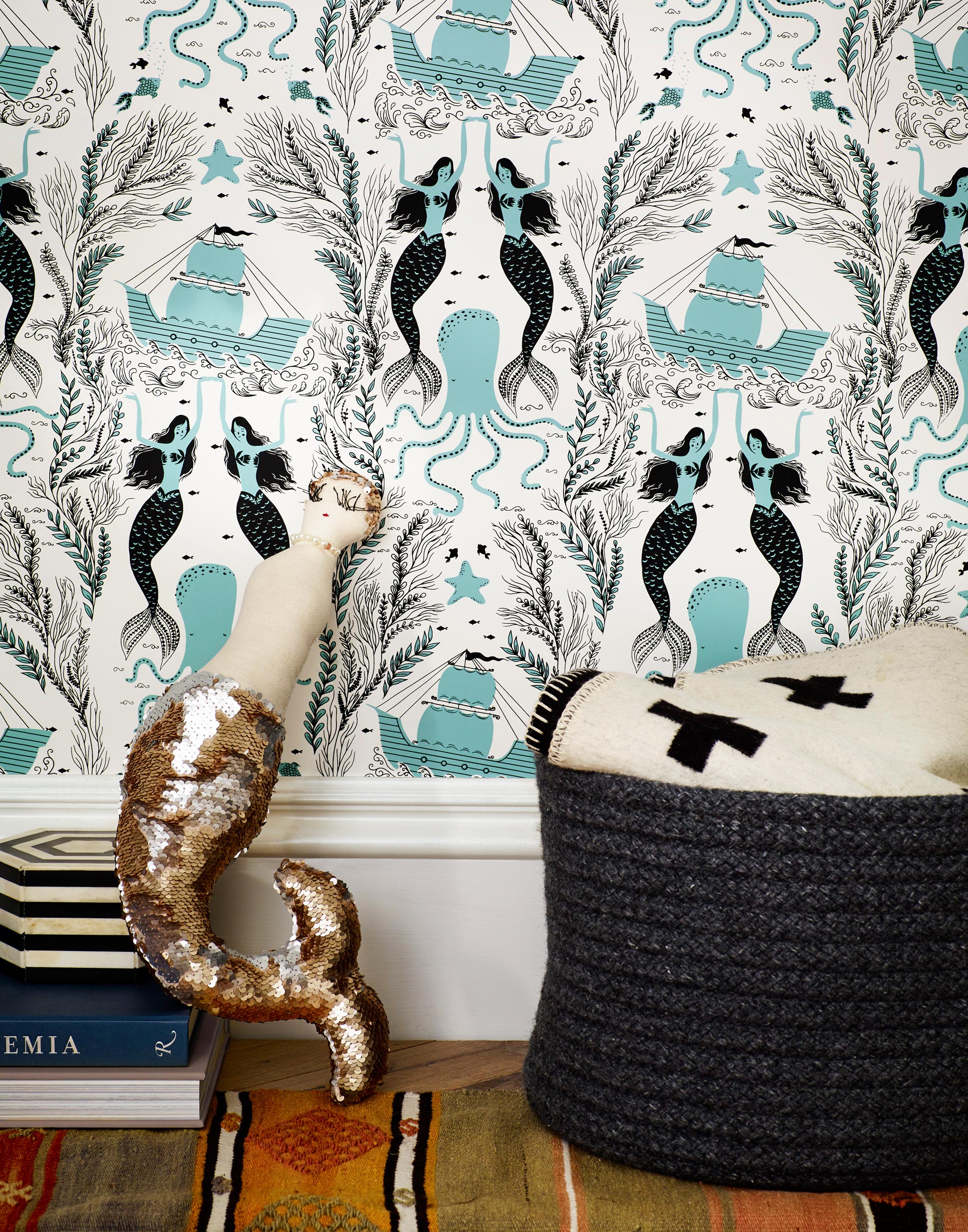 Mermaids (Ocean) wallpaper | Mermaids, fish, octopi and ships float in this charming design | turquoise and black artwork on an off white ground