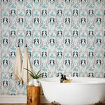 Mermaids (Ocean) wallpaper | Mermaids, fish, octopi and ships float in this charming design | turquoise and black artwork on an off white ground