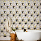 Mermaids (Gold) wallpaper | Mermaids, fish, octopi and ships float in this charming design | Gold and black artwork on an off white ground