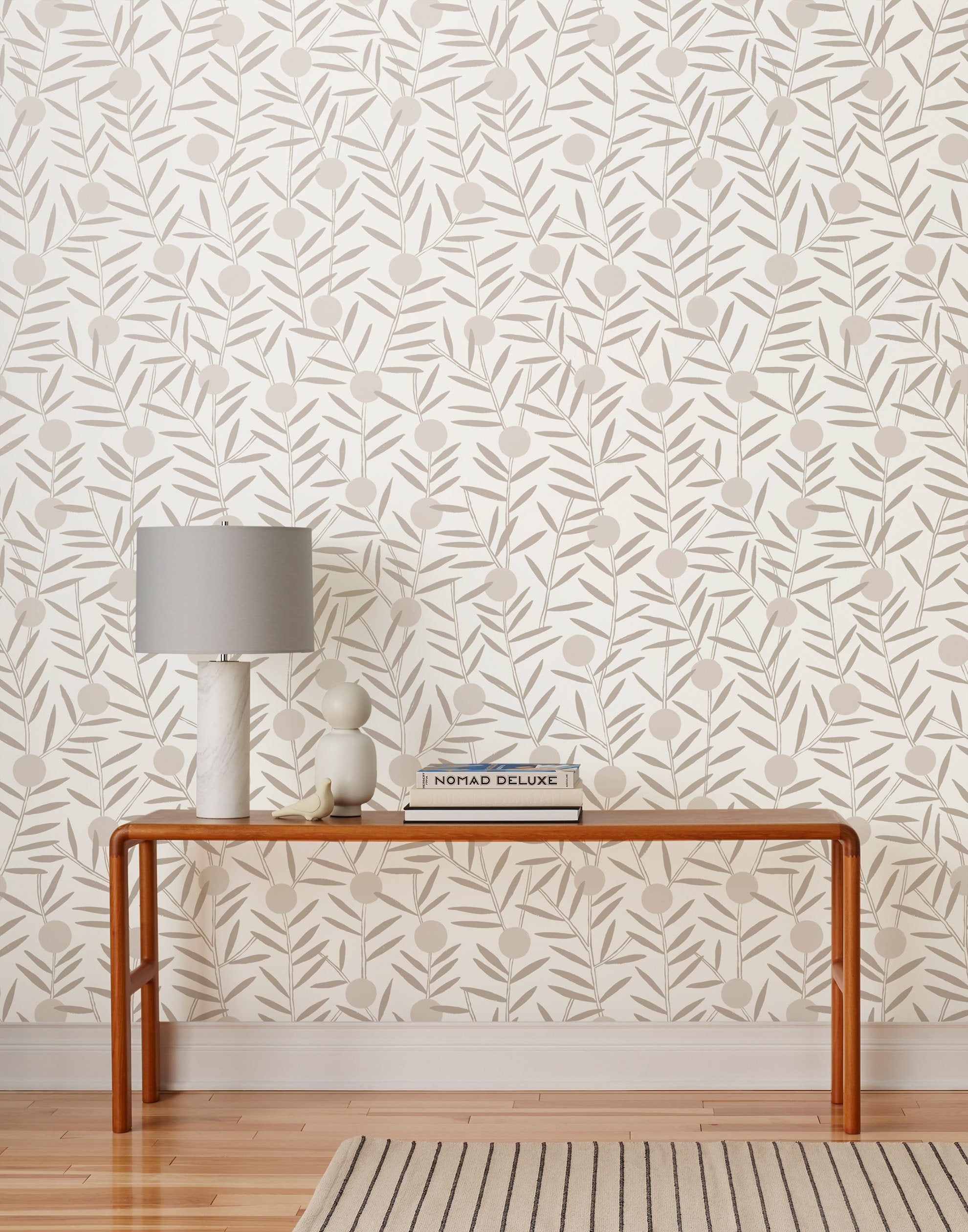 Bloom (Taupe) Wallpaper featuring light gray dots and taupe stems on an off white ground in a modern, graphic floral