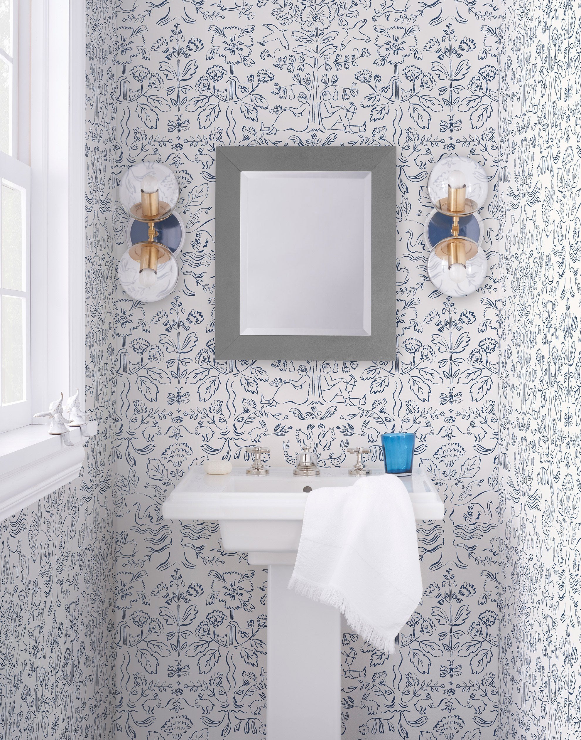 Storyline (Delft Blue) Wallpaper | Folk art inspired pattern featuring flora and fauna in a delft blue on a white ground