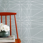 Strike (Mist) features modern, geometric white lines on dusty blue