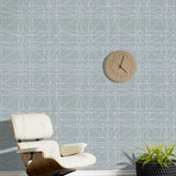 Strike (Mist) features modern, geometric white lines on dusty blue