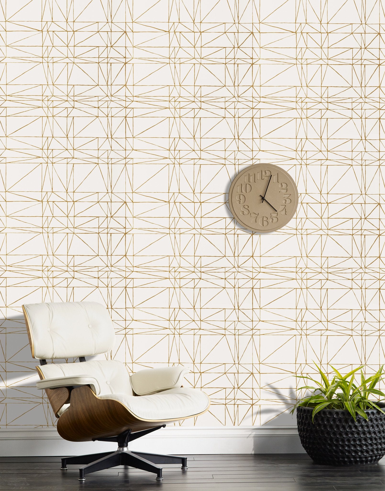 Strike (Gold) features modern, geometric metallic gold lines on white