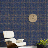 Strike (Navy) features modern, geometric metallic gold lines on navy blue