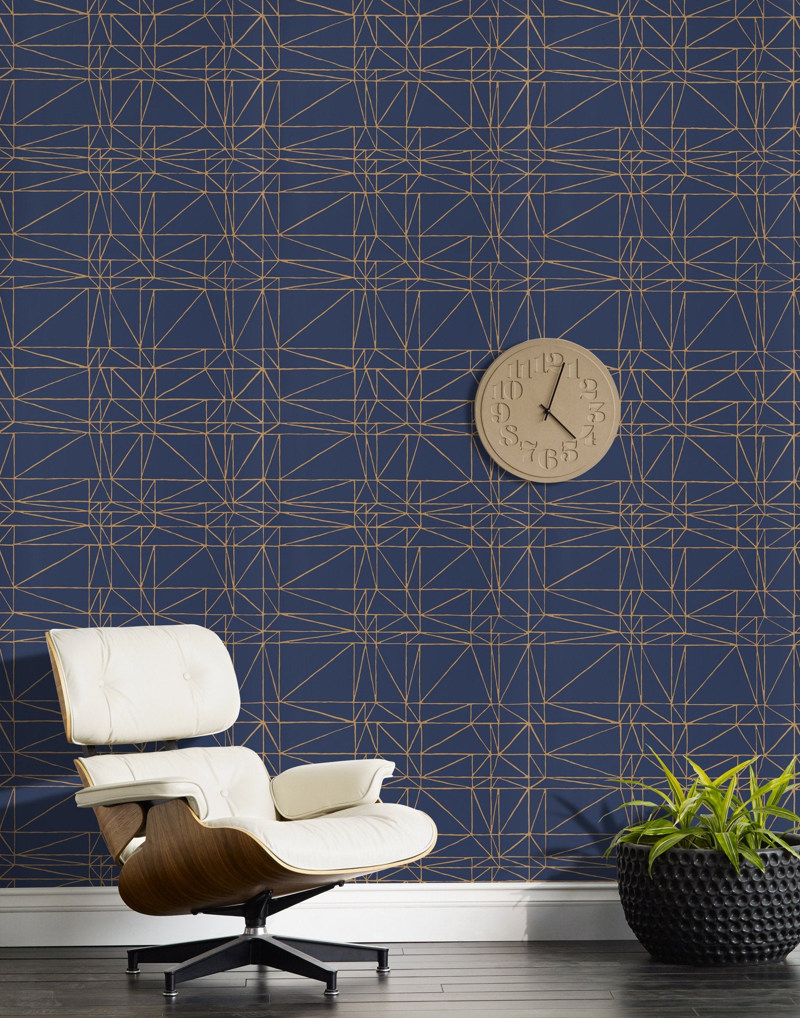 Strike (Navy) features modern, geometric metallic gold lines on navy blue