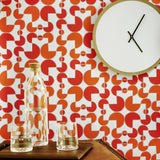 Arcade (Cayenne) wallpaper features modern, geometric lines and shapes in shades of orange