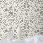 Piedmont (Taupe) wallpaper with foxes and rabbits in shades of gray