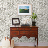 Piedmont (Taupe) wallpaper with foxes and rabbits in shades of gray