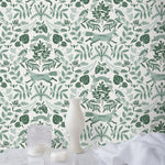 Piedmont (Pine) wallpaper with foxes and rabbits in shades of green