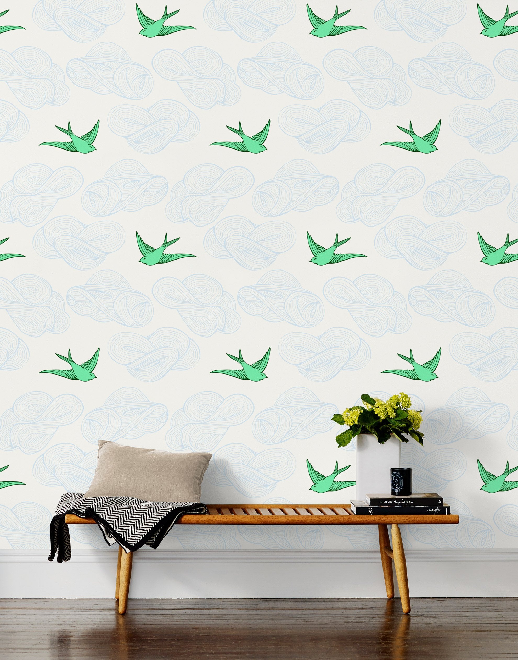 Daydream (Green) features a pattern of flying birds and floating clouds in green and blue white