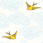 Daydream (Sunshine) features a pattern of flying birds and floating clouds in yellow and blue on white