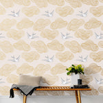 Daydream (Blush) features a pattern of flying birds and floating clouds in metallic gold and white on pink 