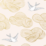 Daydream (Blush) features a pattern of flying birds and floating clouds in metallic gold and white on pink 