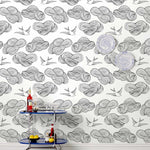 Daydream (Black) features a pattern of flying birds and floating clouds in black on white