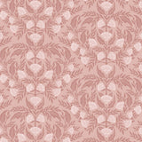 Symmetry wallpaper is a stylized floral wallpaper and designed in linocut style by Katharine Watson for Hygge & West | Dark pink and light pink flowers on a rose pink wallpaper background.