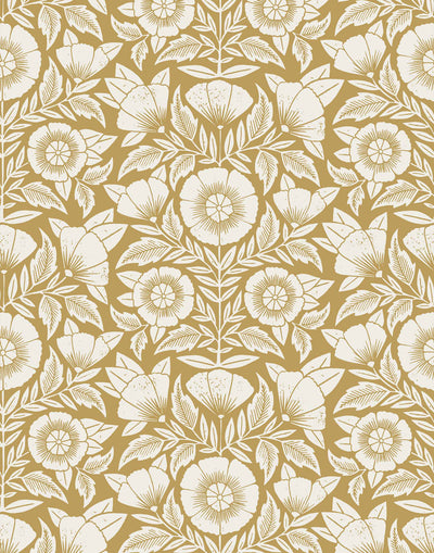 Conservatory wallpaper featuring stylized petals and leaves dervived from a block-print technique was designed by Katharine Watson for Hygge & West. Featuring white flowers on and ochre / yellow mustard wallpaper background.