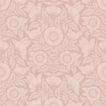 Conservatory wallpaper featuring stylized petals and leaves dervived from a block-print technique was designed by Katharine Watson for Hygge & West. Featuring light pink flowers on a rose pink wallpaper background.