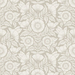 Conservatory wallpaper featuring stylized petals and leaves dervived from a block-print technique was designed by Katharine Watson for Hygge & West. Featuring white flowers on a pewter gray wallpaper background.