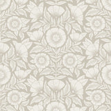Conservatory wallpaper featuring stylized petals and leaves dervived from a block-print technique was designed by Katharine Watson for Hygge & West. Featuring white flowers on a pewter gray wallpaper background.
