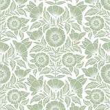 Conservatory wallpaper featuring stylized petals and leaves dervived from a block-print technique was designed by Katharine Watson for Hygge & West. Featuring sage green flowers on a white wallpaper background.
