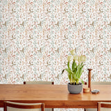 Sonoma (White) wallpaper with rust, green and brown flowers and leaves on a true white background