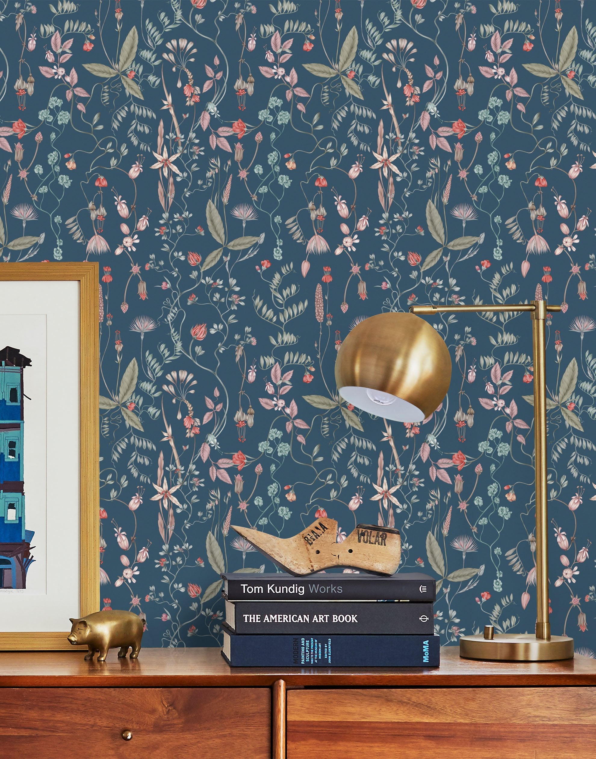 Sonoma (Indigo) wallpaper with green, mauve, coral and pink flowers and leaves on a blue background