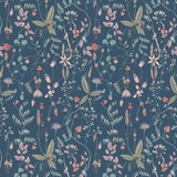 Sonoma (Indigo) wallpaper with green, mauve, coral and pink flowers and leaves on a blue background