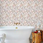 Atoll (White) wallpaper features shades of green, coral and brown seaweed and coral on a true white background
