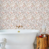 Atoll (White) wallpaper features shades of green, coral and brown seaweed and coral on a true white background