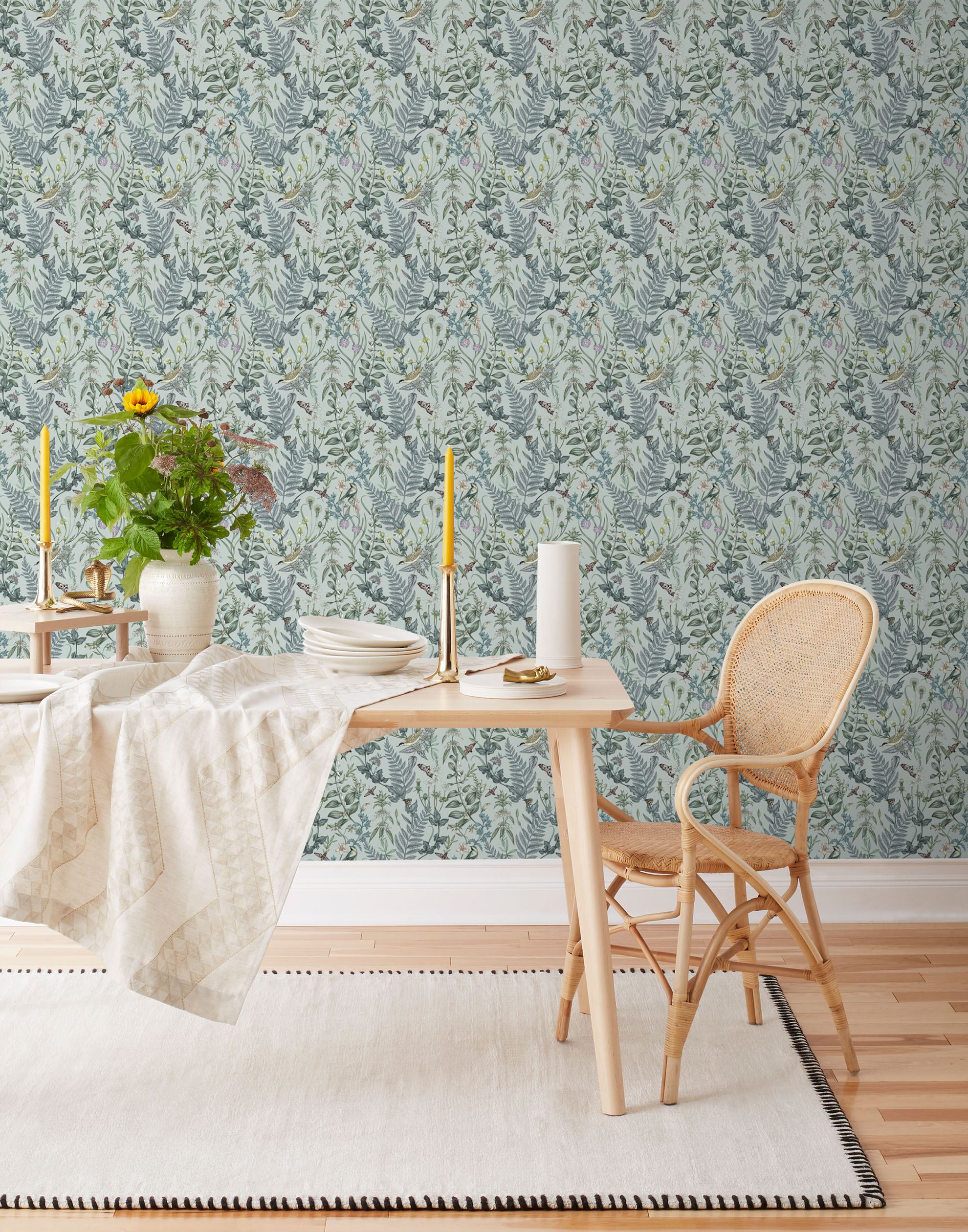 Secret Garden (Robin Egg) wallpaper features shades of green, blue and brown plants, birds and butterflies on a robin egg blue background