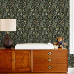 Secret Garden (Ebony) wallpaper features shades of green, pink and taupe plants, birds and butterflies on black background