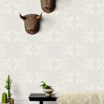 Andanza Taupe wallpaper featuring a delicate pattern created using a stippling technique in taupe gray on white