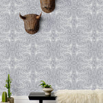 Andanza Navy wallpaper featuring a delicate pattern created using a stippling technique in navy blue on white