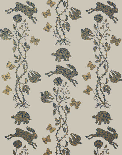Fable (French Gray) Wallpaper featuring gold and navy rabbits, turtles, butterflies and flowers on a warm gray background