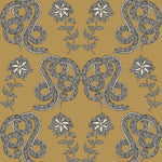 Serpentine (Butterscotch) Wallpaper featuring charcoal and cream snakes and flowers on a golden ochre yellow background