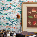 Inspired by the Fauvism movement, Plein Air brings the rolling countryside to life with a gestural brushwork technique. Its colors are joyful and bold while semi-realistic to the subject, including a range of green and blue hues with hints of coral and lavender.