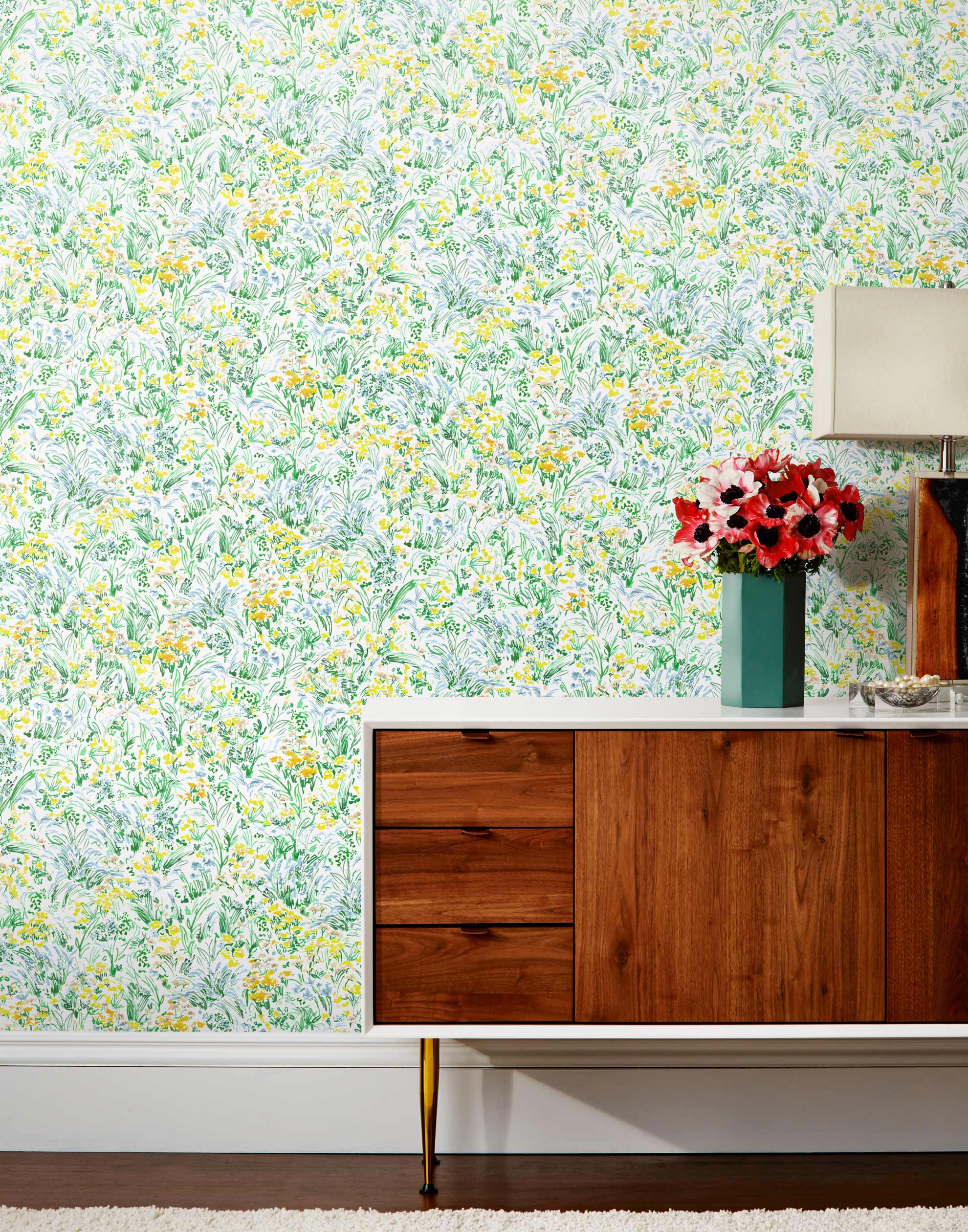 Summer (Sunshine) wallpaper features loose brushstrokes that capture the movement of wild flowers and grasses swaying in the breeze. Yellow, gold, light blue, and green watercolored flora on a white background | Hygge & West