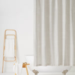 Andanza Shower Curtain featuring a delicate pattern created using a stippling technique in taupe gray on white