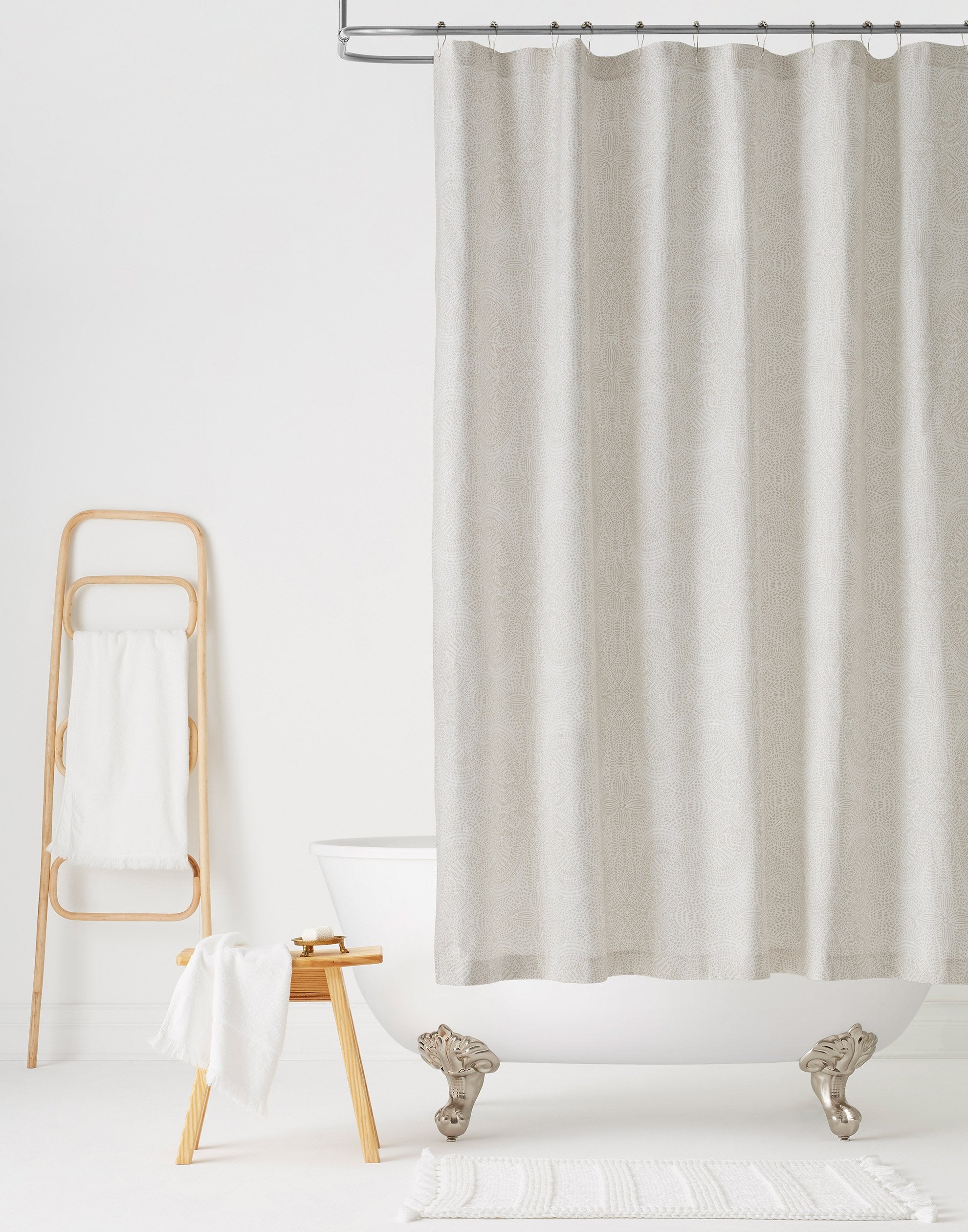 Andanza Shower Curtain featuring a delicate pattern created using a stippling technique in taupe gray on white
