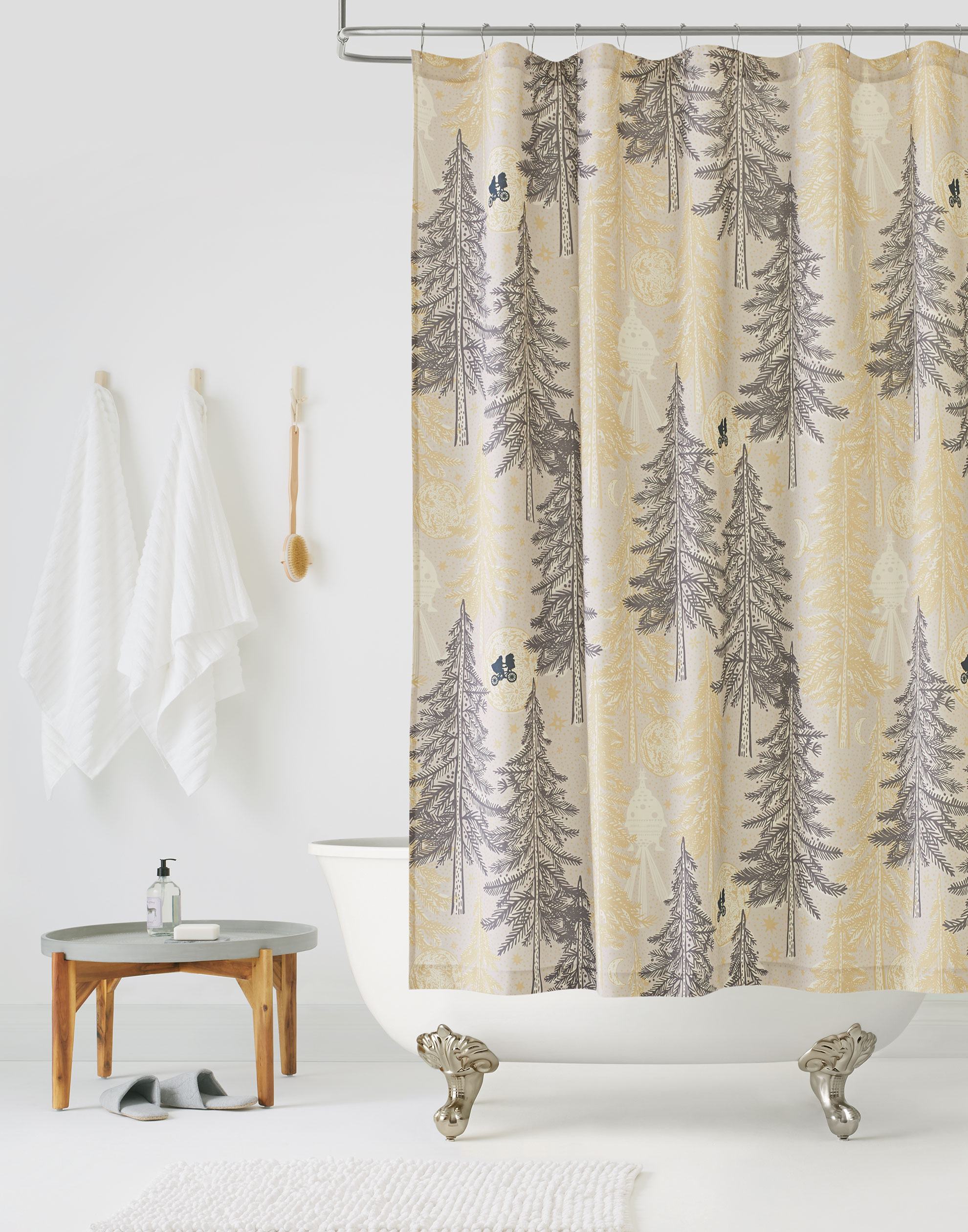 Be Good (Dusk) Shower Curtain with gray and gold illustrations on a cream background depicts scenes from the iconic movie E.T. the Extra-Terrestrial and was created in collaboration with Universal | Hygge & West