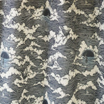 Amity Sunset (Ink) Shower Curtain with dark blue and cream illustrations depicts scenes from the iconic movie Jaws and was created in collaboration with Universal | Hygge & West