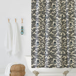Amity Sunset (Ink) Shower Curtain with dark blue and cream illustrations depicts scenes from the iconic movie Jaws and was created in collaboration with Universal | Hygge & West