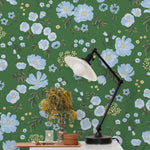 Cascade Meadow (Juniper) featuring hand drawn flowers in light blue and yellow on a green background | Schoolhouse x Hygge & West